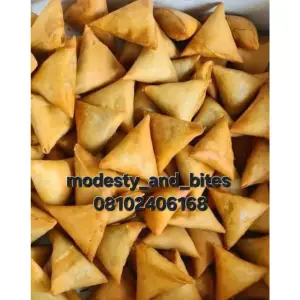 fried samosa sold by Modesty_and_bites